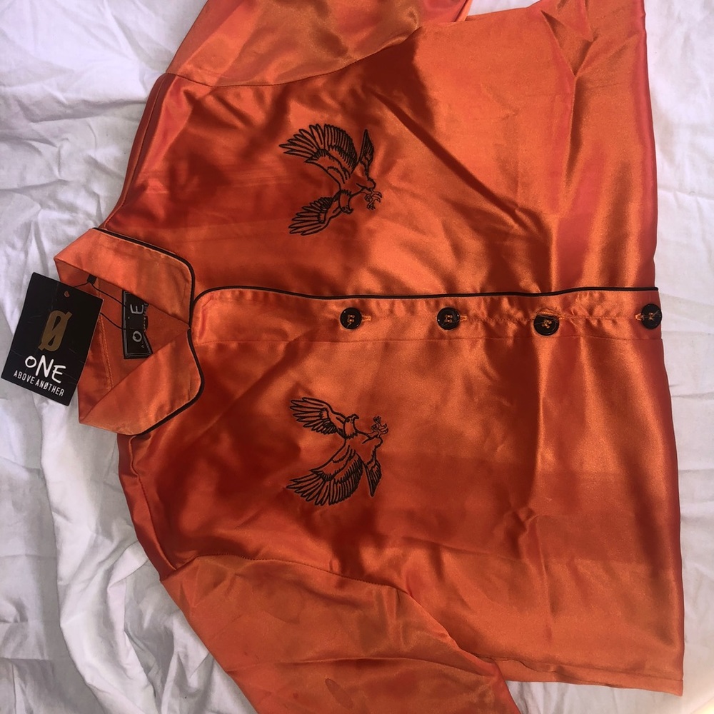Orange silk button up with tiny black design
